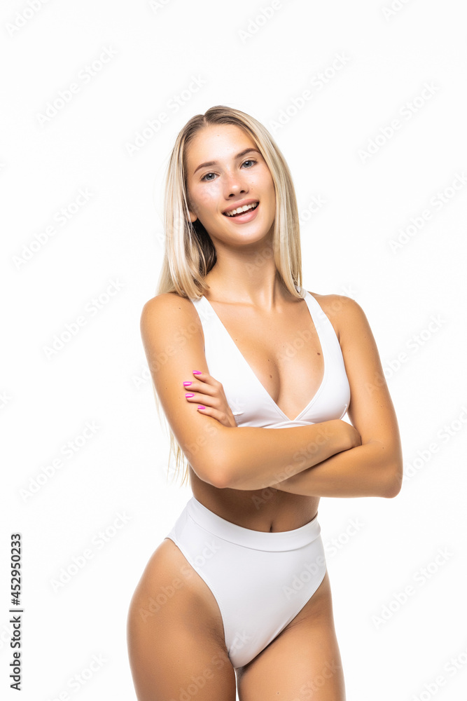 Sexy body of a beautiful woman. Beautiful woman body. Perfect shining skin for summer. Slim tanned woman's body. Isolated over white background. Sexy body of a beautiful woman. Beautiful woman body. Perfect shining skin for summer. Slim tanned woman's body. Isolated over white background.
