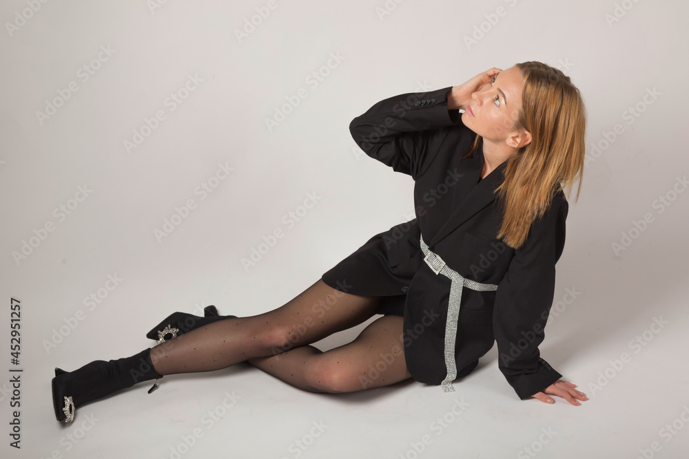 Young blonde model appearance posing in the studio Young blonde model appearance posing in the studio