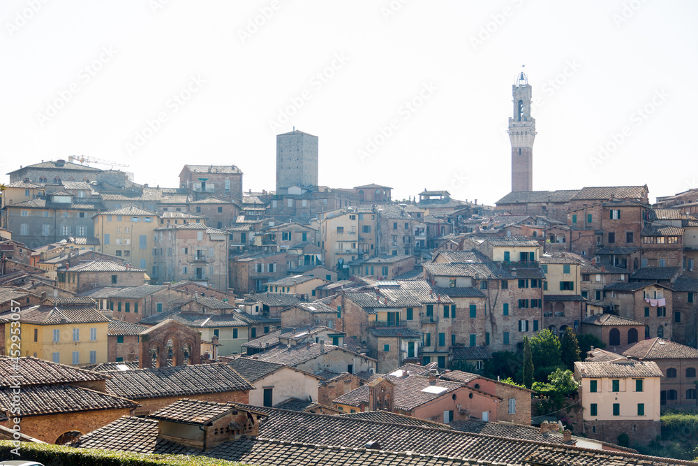 Siena Cathedral (Italian: Duomo di Siena) and panoramic city views. Old historic town in Italian Tuscany