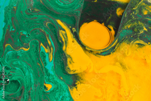 acrylic paint, green sea waves with some yellow holes. Color mixing produces green hues