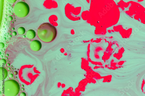 Isolated red spots and green bubbles. With maroon waves
