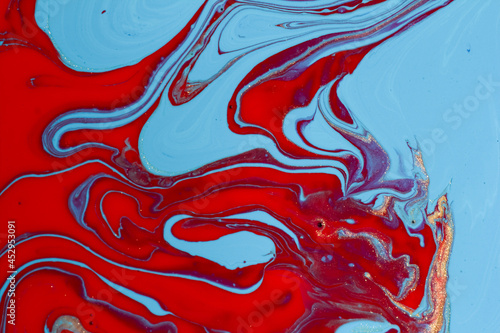 Acrylic of red, blue and gold colors that form beautiful waves and waves. It is shaped like a river or delta