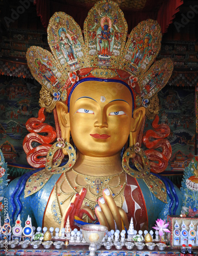 Maitreya Buddha at Tiksey Monastery, Buddha statue close up Tibetan monastery. Ladakh, Jammu and Kashmir, India photo