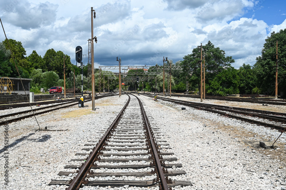 Railway tracks on railway station. Travel and transportation. Close up of Railroad tracks.