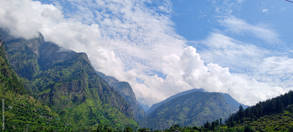 Colorful landscape with high Himalayan mountains, green forest, Mountain valley. Travel in himalayas