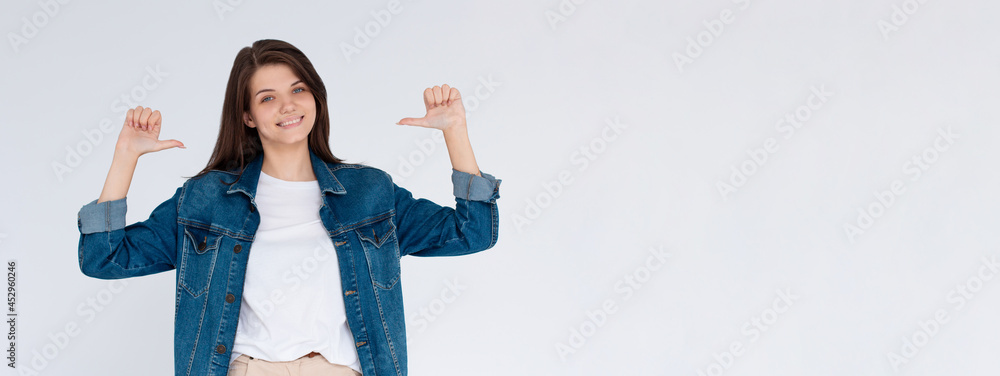 Portrait of woman pointing on herself isolated on white background Portrait of woman pointing on herself isolated on white background