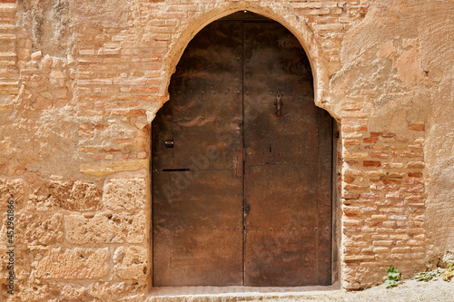 Old door in the Alhambra in Granada in Spain