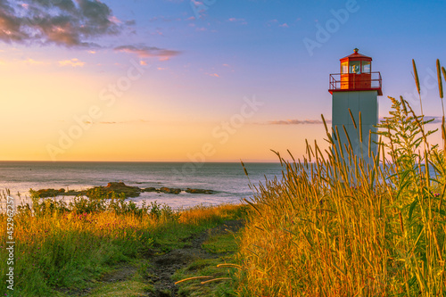 Sunrise from West Quaco Point Lighthouse, in New Brunswick, overlooking the Bay of Fundy. 
