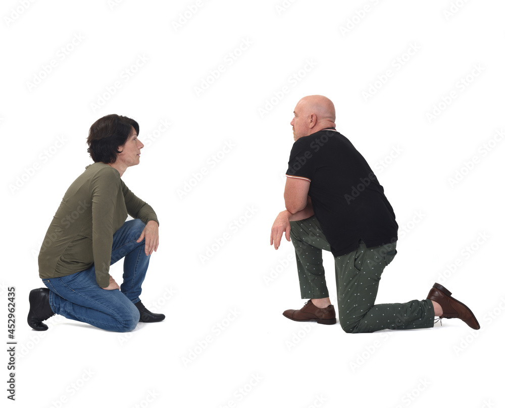 couple on knees on white background couple on knees on white background