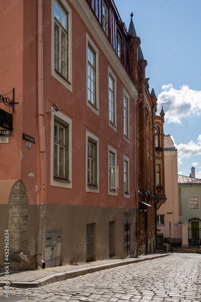 narrow cobblestone streets and historic buildings in the old city center of Tallinn
