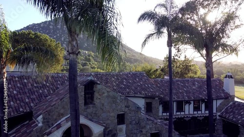 The Aerial drone shot of the wedding venue at Mt. Woodson Castle on a sunny day photo