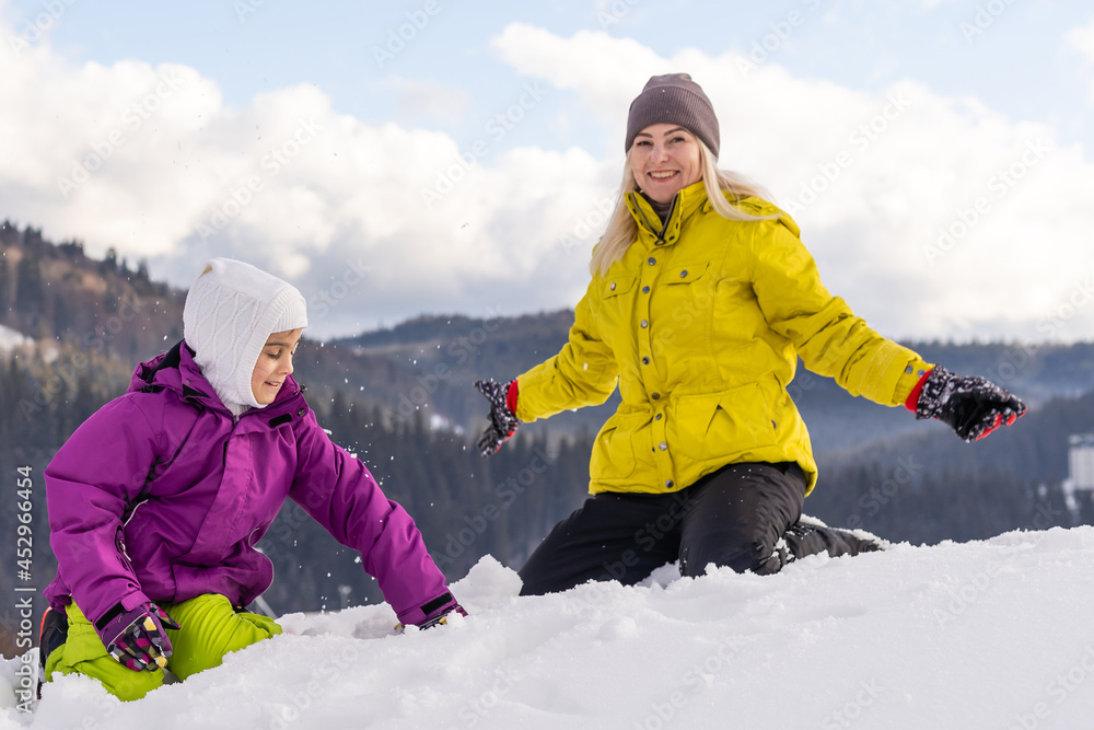 Winter,ski, snow and sun - family enjoying winter vacation Winter,ski, snow and sun - family enjoying winter vacation