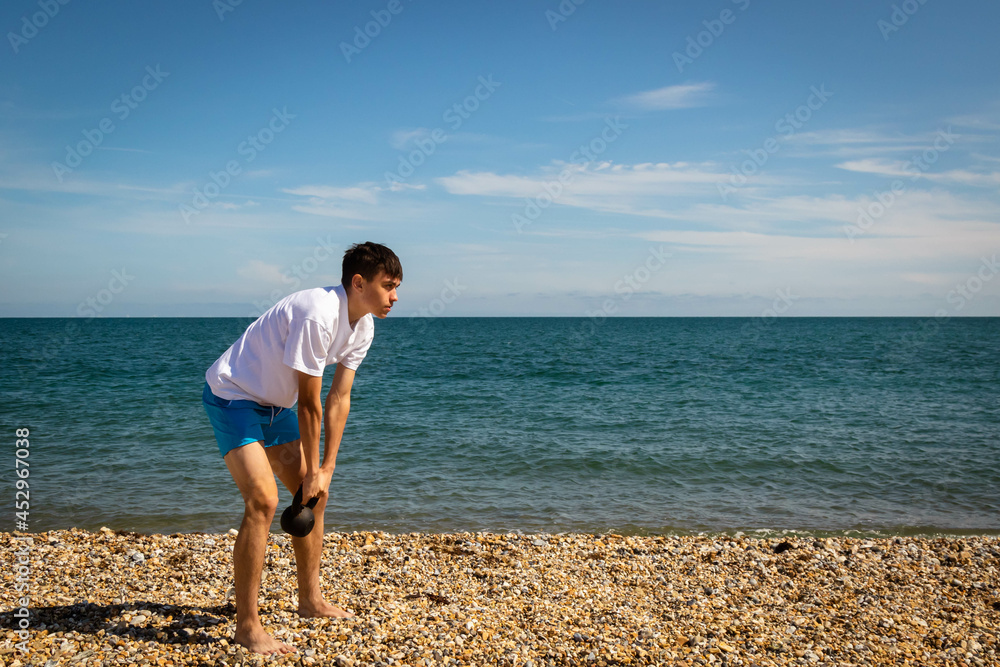 Exercising with a kettlebell weight