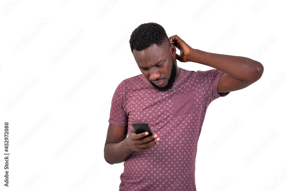 handsome young man using a mobile phone. handsome young man using a mobile phone.