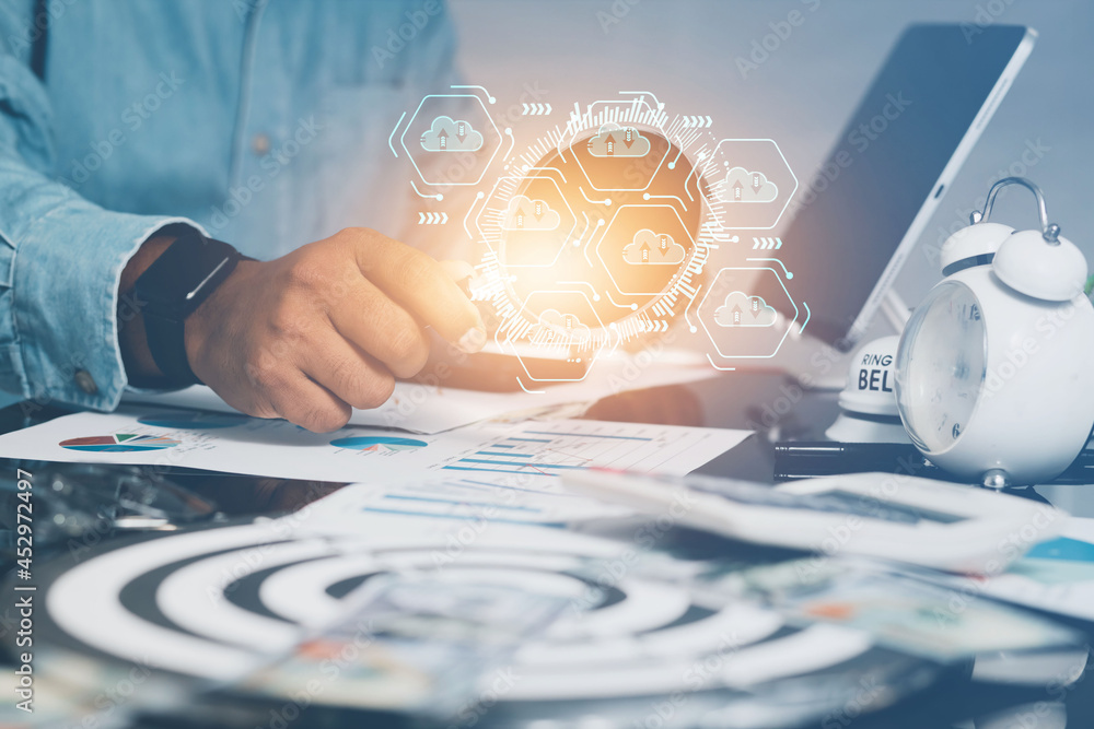 cloud business network concept Businessman looking for information about investment business. technology concept cloud business network concept Businessman looking for information about investment business. technology concept