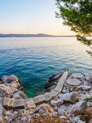 Fototapeta Naklejka Na Ścianę i Meble -  Sunset on the beach in Novi Vinodolski Croatia