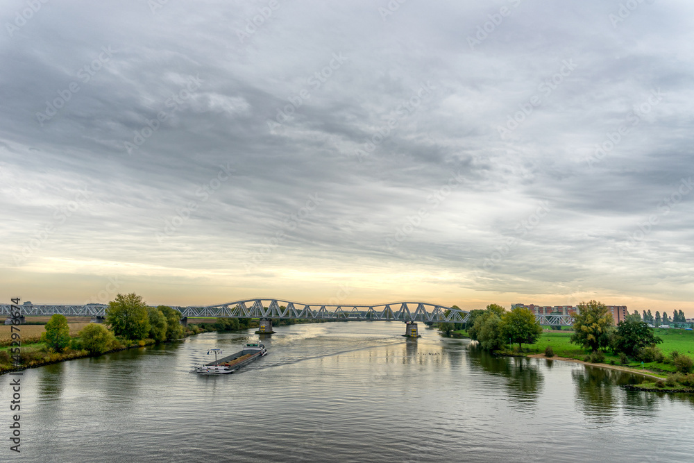 Fototapeta premium View over the Maas river from the Maasbrug near 's-Hertogenbosch in October