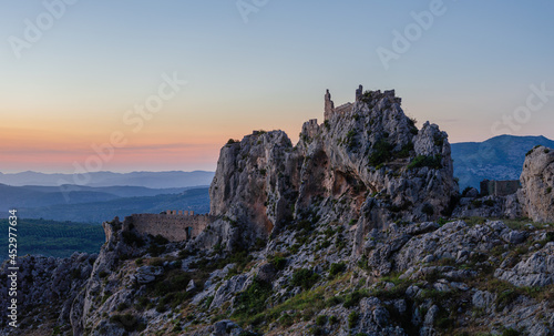 Sunset in the mountains with castle