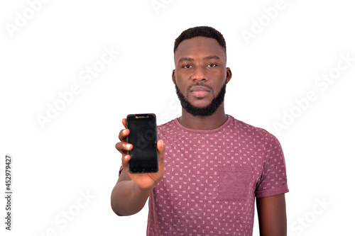 handsome confident young man showing mobile phone.