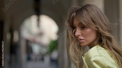 Wallpaper Mural Stylish Girl With Long Hair Walks Down Street Of Ancient City. Torontodigital.ca