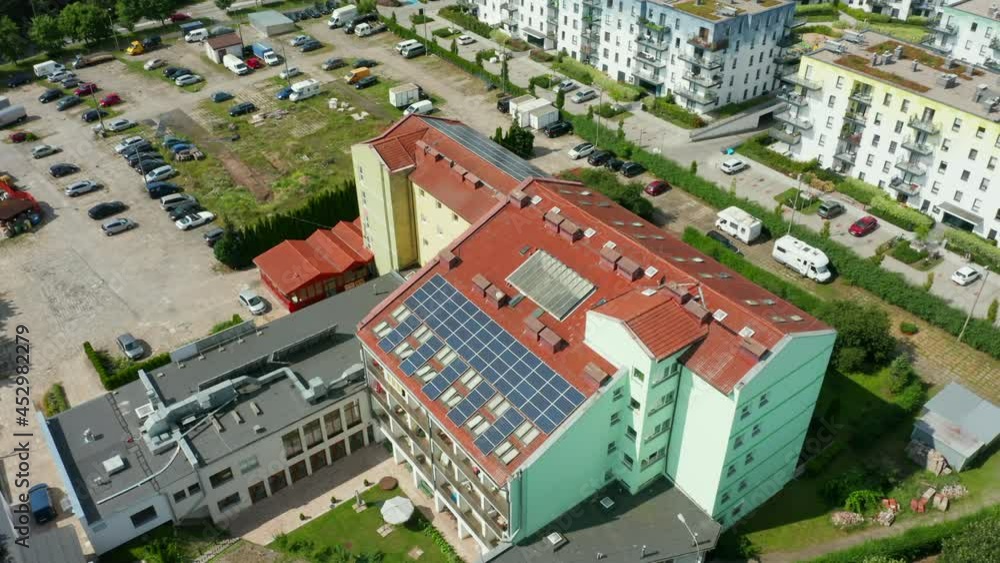Aerial view of photovoltaic solar panels installed on the flat roof of an office building. The concept.renewable energy, technologies, electricity, service, green, the future. Aerial view of photovoltaic solar panels installed on the flat roof of an office building. The concept.renewable energy, technologies, electricity, service, green, the future.