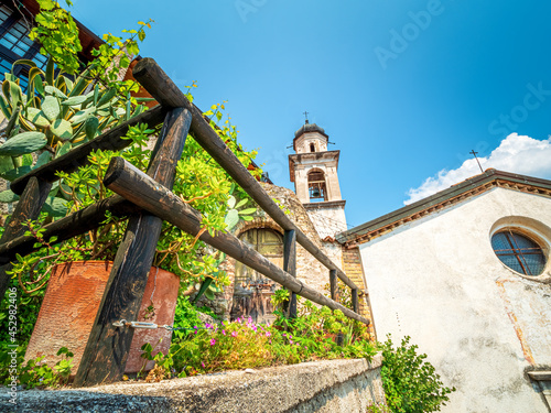 Church san Rocco view at Limone sul Garda with old and traditional architecture photo