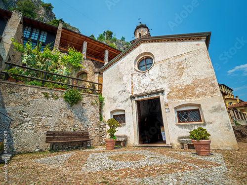 Church san Rocco view at Limone sul Garda with old and traditional architecture photo