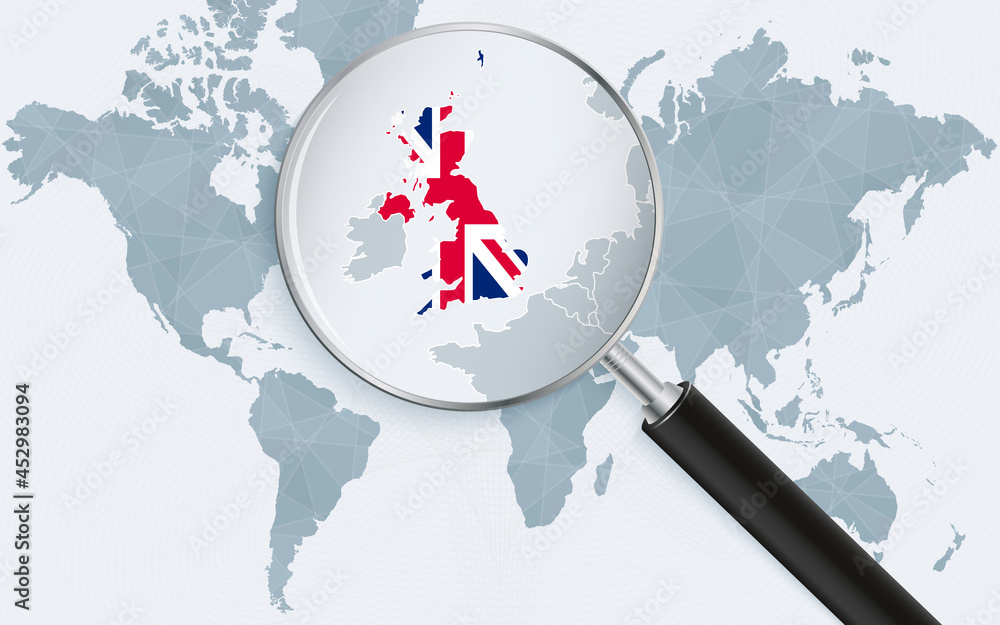 World map with a magnifying glass pointing at United Kingdom. Map of United Kingdom with the flag in the loop.