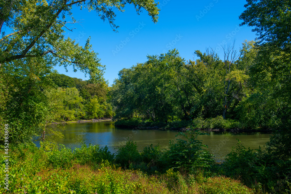 Fototapeta premium Concord River in Minute Man National Historical Park, Concord, Massachusetts MA, USA.