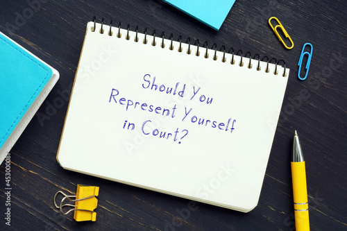 Legal concept about Should You Represent Yourself in Court?  with sign on the page. photo