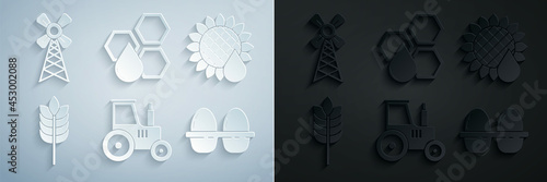 Set Tractor, Sunflower, Cereals with rice, wheat, corn, oats, rye, Chicken egg in box, Honeycomb and Windmill icon. Vector