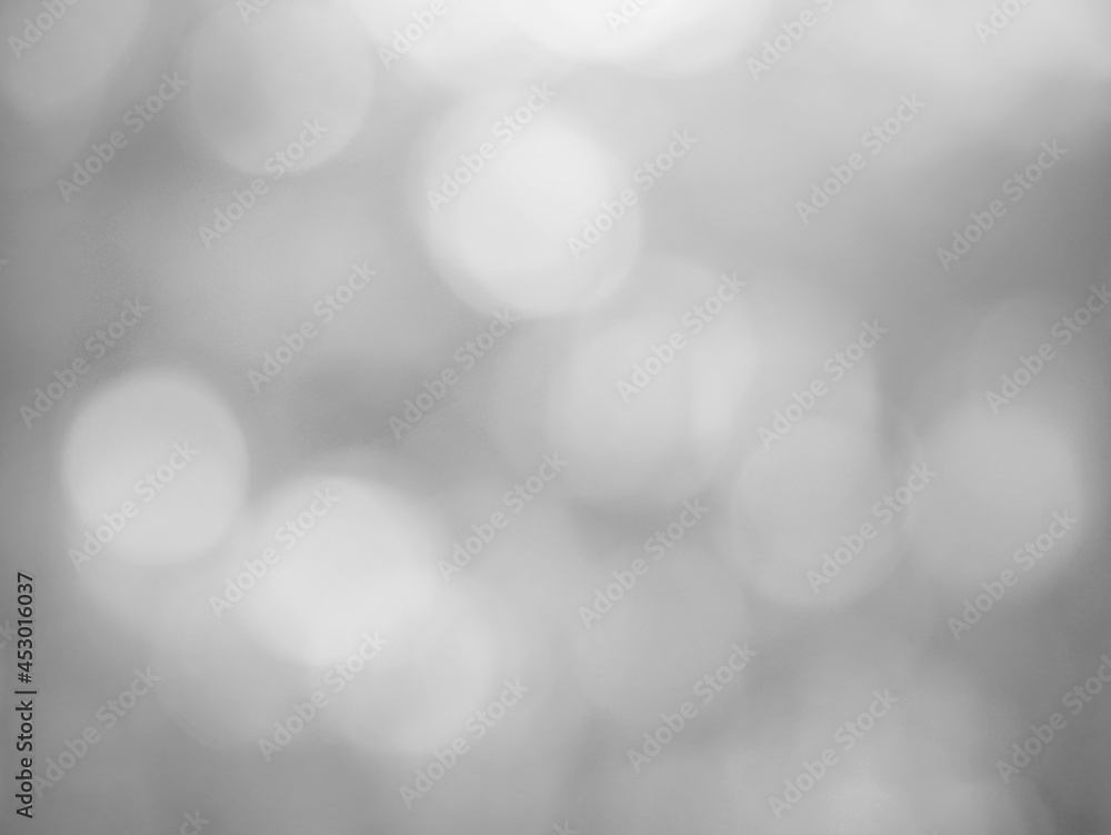 The illuminated white bokeh image can be used as a background illustration or add text. The illuminated white bokeh image can be used as a background illustration or add text.