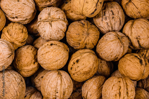 Heap of many walnuts for the background