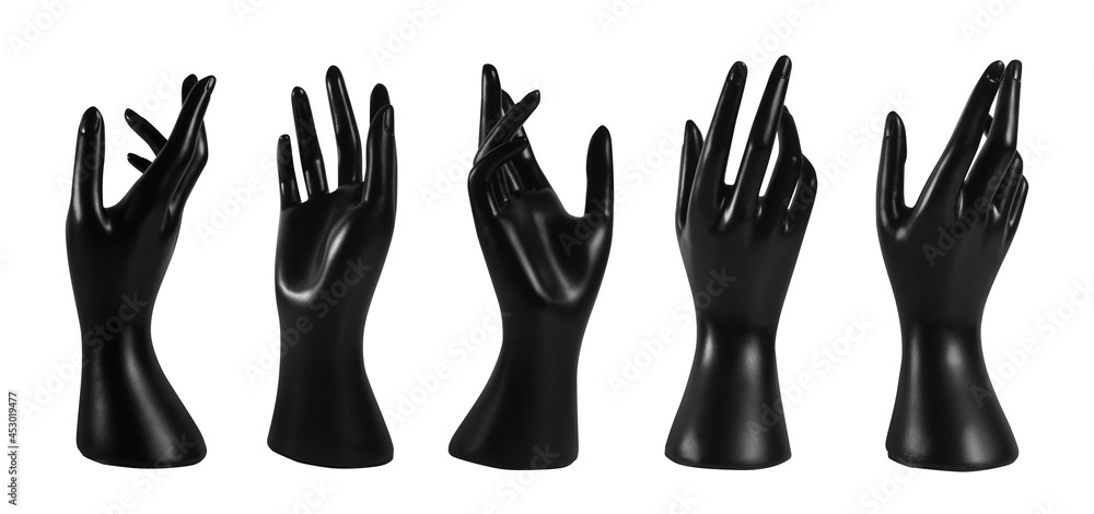 Isolated photo of black colored mannequin hand jewelry holder on white background. Isolated photo of black colored mannequin hand jewelry holder on white background.