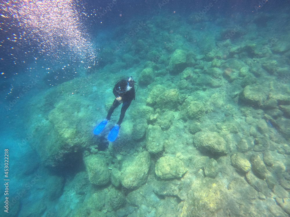 Fototapeta premium Tourists scuba dive Mediterranian Sea. Marmaris,Turkey.