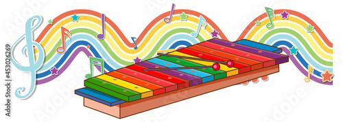 Xylophone with melody symbols on rainbow wave