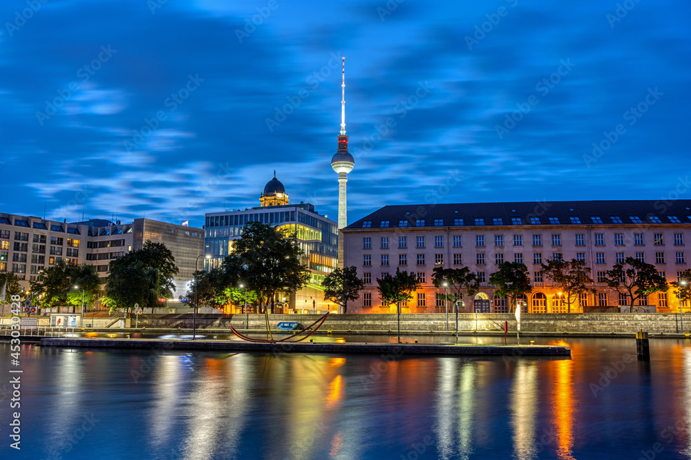 The river Spree and the famous TV Tower in Berlin at night