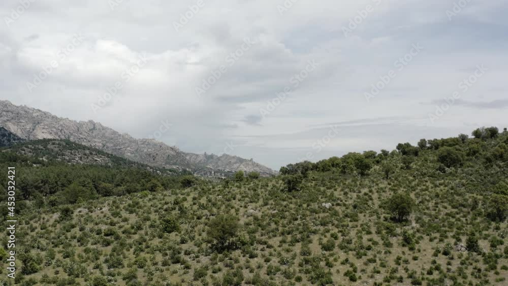 Aerial drone pull out over the Sierra De Guadarrama Mountain range revealing this epic Spanish Landscape Aerial drone pull out over the Sierra De Guadarrama Mountain range revealing this epic Spanish Landscape
