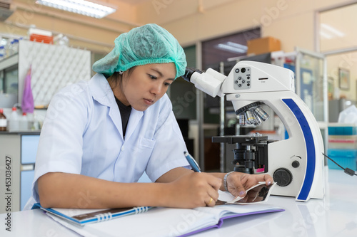 Picture of the scientists working in the laboratory, Scientists using tablet a search data in lab , Concept science and technology, Science background