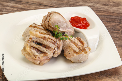 Grilled pork tenderlion with tomato sauce