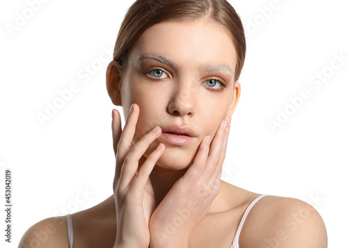 Beautiful young woman with ...
