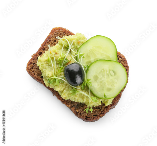 Tasty sandwich with guacamole, olive and cucumber on white background