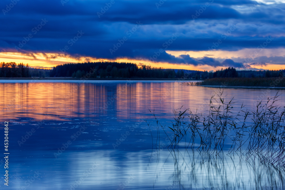 Blue sunset on the beautiful lake