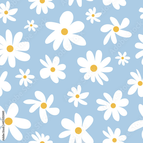 Vector hand drown camomiles seamless pattern on a soft blue background