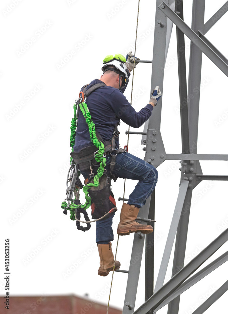 Electrician is working on a pole Electrician is working on a pole