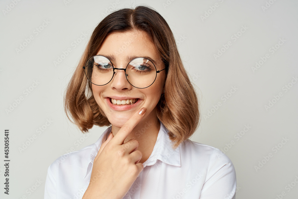 pretty woman in white shirt wearing glasses manager office work pretty woman in white shirt wearing glasses manager office work
