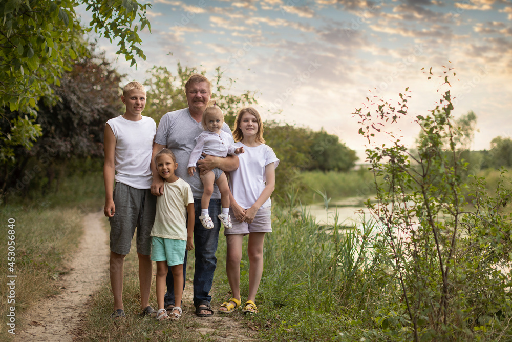 Dad with four children