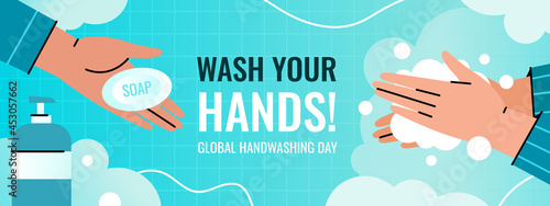Global handwashing day horizontal banner. Person washes hands with a foam dispenser to prevent infection. The hand holds out the soap.