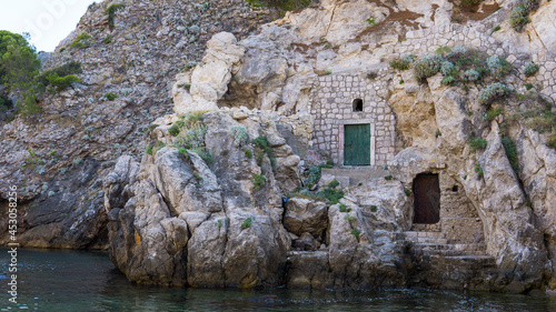 Rocks in Dubrovnik with mysterious door