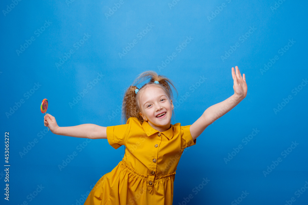 little girl  dance on a blue background
